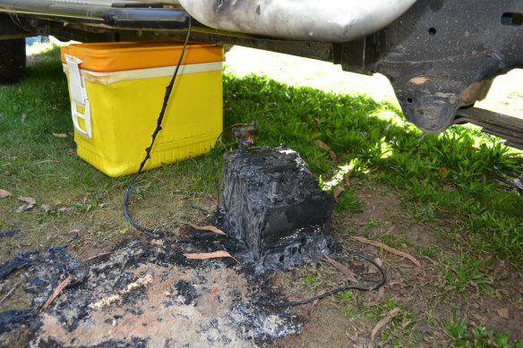 The yellow esky and burnt battery found at Bucks Camp in March 2020.
