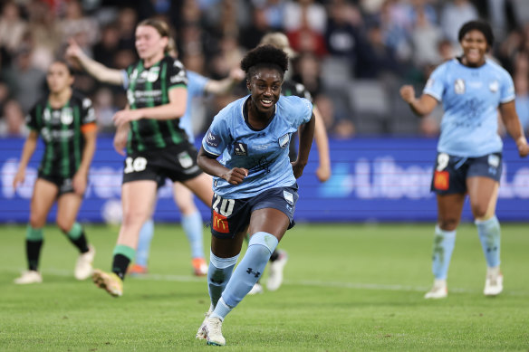 Princess Ibini celebrates the spot-kick which put her side 3-0 up.