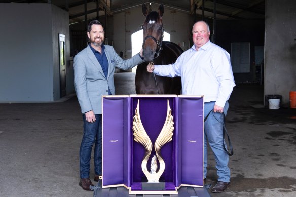 David McGrath and trainer Brad Widdup with Icebath and the Golden Eagle trophy. 