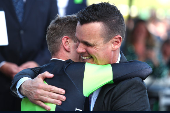  Joe Pride embraces jockey Sam Clipperton after their Everest win.