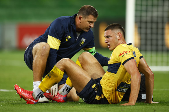 Lewis Miller needed treatment after being trodden on by Mathew Leckie but was not awarded a penalty.