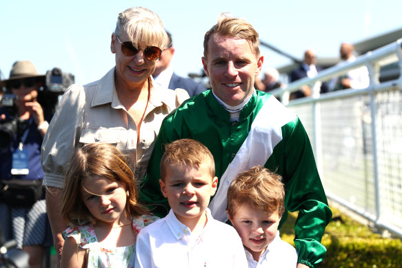 Tommy Berry with three of his four children and mother Julie after his Gimcrack Stakes win last month.