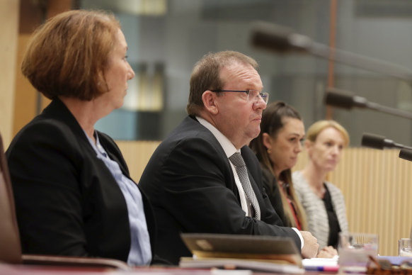 Auditor-General Grant Hehir, centre, will be able to add 52 staff to the audit office after receiving a funding increase.