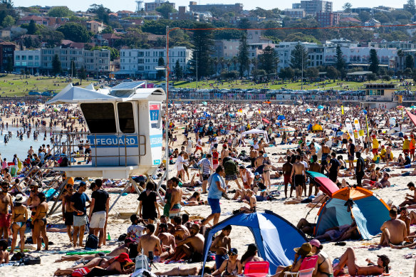 Bondi Beach was almost at full capacity but still open on Monday. 