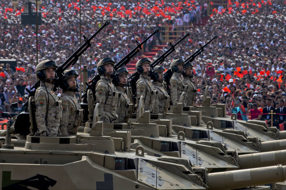 Chinese soldiers mark the 70th anniversary of the founding of the People’s Republic of China in Beijing in 2019.