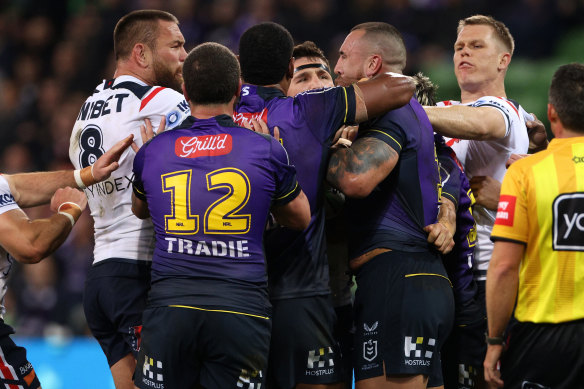 Heavyweight battle: Roosters prop Jared Waerea-Hargreaves faces off with Melbourne’s Nelson Asofa-Solomona.