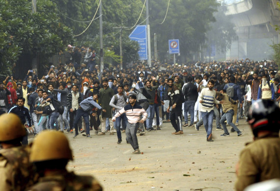 Students protest outside Jamia Millia Islamia University in New Delhi.