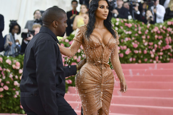 Reality TV star Kim Kardashian, pictured with then husband Kanye West, is considered one inspiration for many women seeking cosmetic surgeries in Australia.
