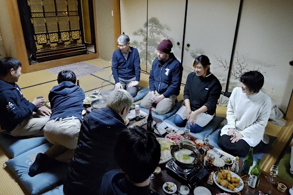 Matt Froude shares a meal with co-workers at the Matsuse brewery in Shiga prefecture, Japan.
