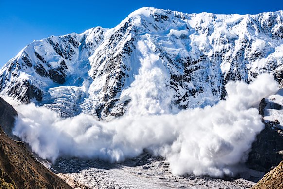 An avalanche in the Caucasus, Kabardino-Balkaria, Bezengi region, Russia. 