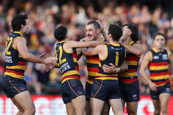 Taylor Walker celebrates one of his 10 goals. 