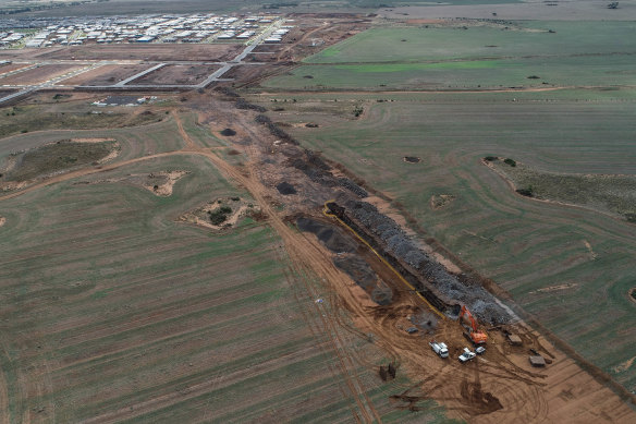 The Wyndham Vale rail stabling yard now under construction is just north of housing estates.
