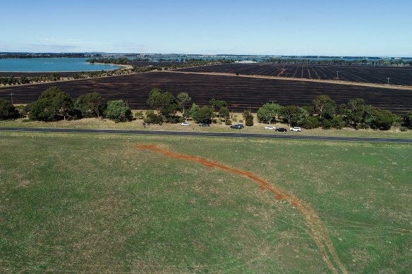 The scar on the landscape left after the stones were removed.