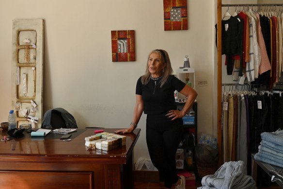 Carol Khalife in her clothing boutique in Bsharri. She and her husband will stay in  Lebanon unless their area comes under Israeli attack. 