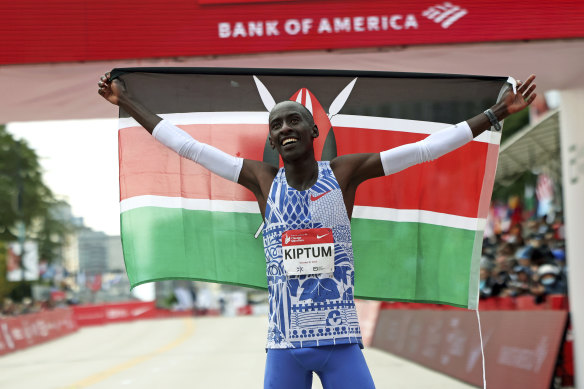 Kelvin Kiptum celebrates his Chicago Marathon record victory in October.