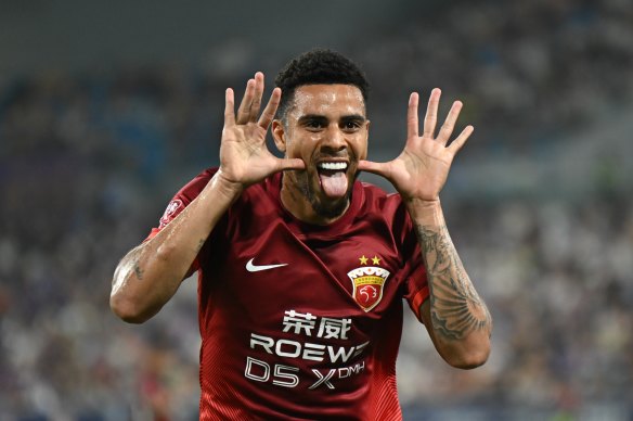 Brazilian striker Gustavo celebrates one of his many goals this season for Shanghai Port.