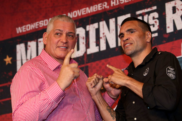 Gatto appears with boxer Anthony Mundine at a promotional event in 2014.