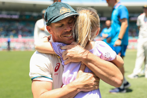 David Warner with his youngest daughter after retiring.