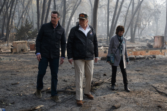 California Governor-elect Gavin Newsom, President Donald Trump and Paradise mayor Jody Jones in Paradise, California, in 2018.