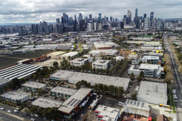 Dexus has taken a haircut on a Fishermans Bend development site.