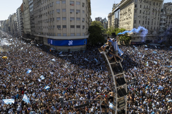 Argentine soccer fans descend on Buenos Aires’ Obelisk to celebrate their team’s World Cup victory over France.