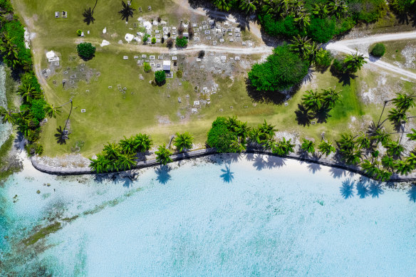 The tranquil waters and swaying palms of Home Island.