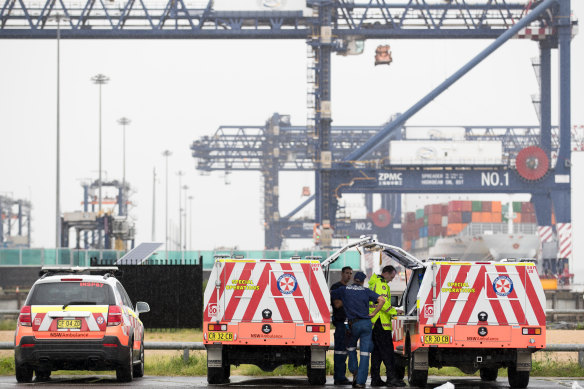 A sick crew member is removed from the Ruby Princess on Thursday afternoon.