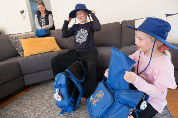 Candice Van Schellen and her daughters Mia, 10, and Maddison, 8, preparing to go back to school.