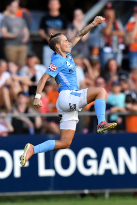 Full flight: Jessica Fishlock celebrates after putting City 2-0 up against the Roar.