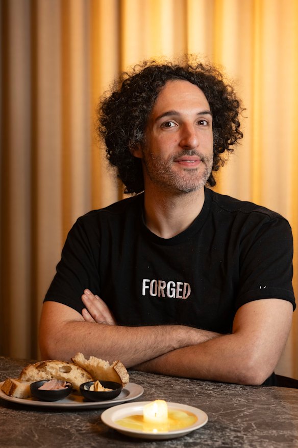 Vow CEO and founder George Peppou with some Forged parfait and a quail tallow candle.