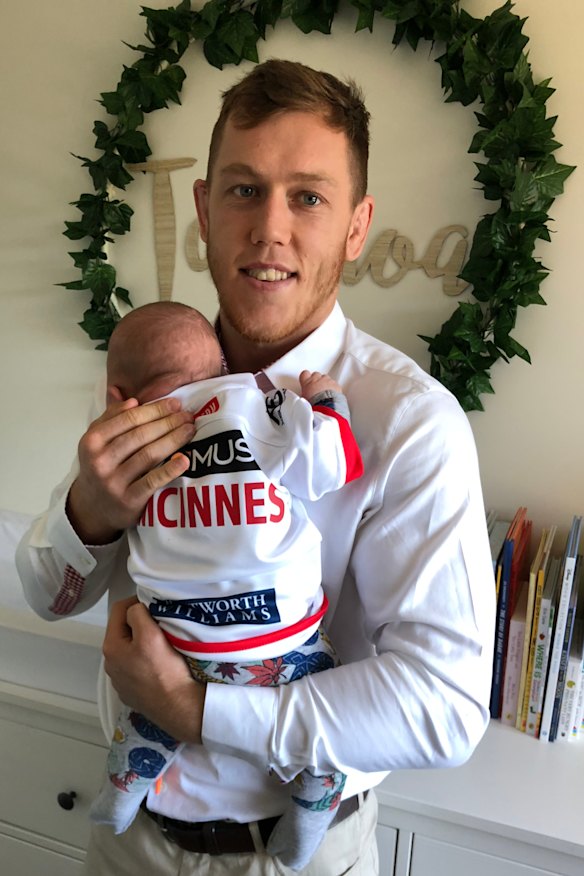 Higher duties: Cameron McInnes with new baby Talanoa.