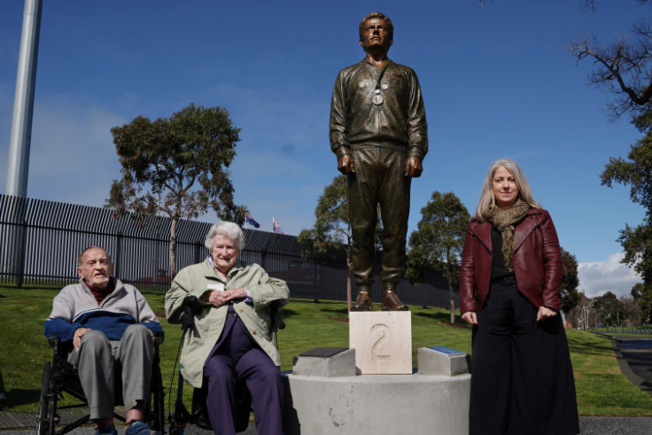 From Silver To Bronze Statue Marks Runner S Inspirational Stance