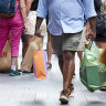 Discount retailers, holiday travel operators cash in as cost of living bites