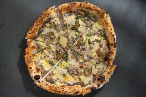 Pizza 2807 with fior di latte, porcini, mushroom cream and sausage.