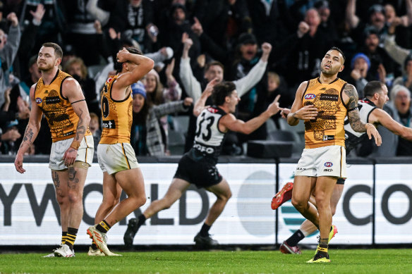 Darcy Byrne-Jones celebrates a win for the ages for Port Adelaide on Sunday night.