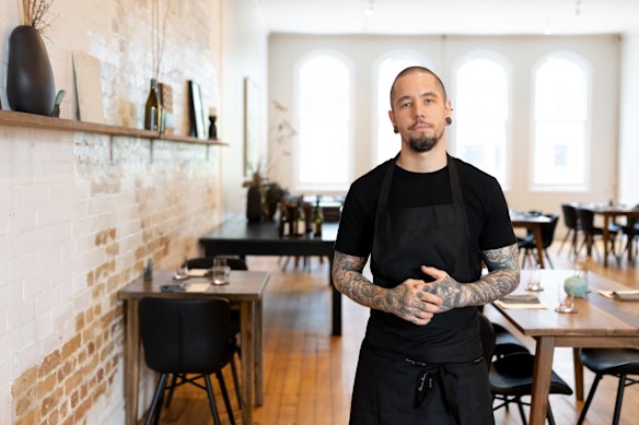 Chef Matt Blackwell in the dining room at Pneuma.