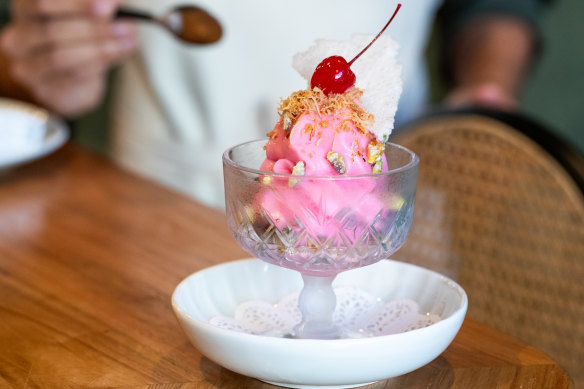 The rose-scented faluda soft-serve is crowned with a maraschino cherry.