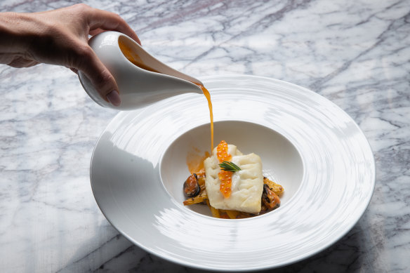 The go-to dish: Black cod in a mussel broth with saffron-braised fennel.