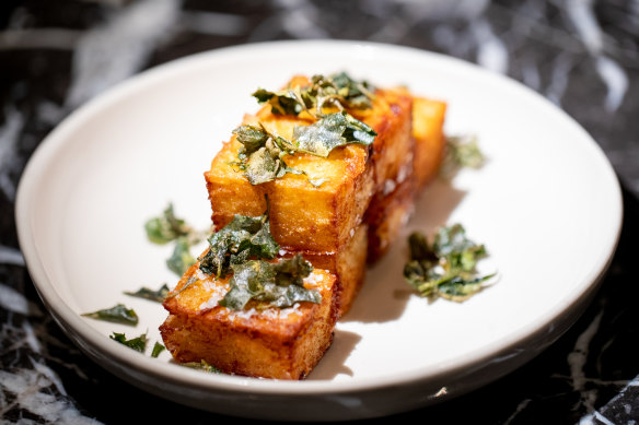 Crisp, golden cubes of potato roesti with saltbush. 