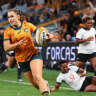 Desiree Miller runs in to score a try during the women’s International Test match between Australia and Fiji in Sydney in July 2024