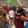 Panic buying creates 'traffic congestion, crowd issues' at Queensland shops