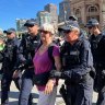 Dozens arrested as climate protesters bring CBD traffic to a standstill