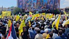 Iranian protesters march in Tehran’s Revolution Square following Israeli airstrikes on the country.