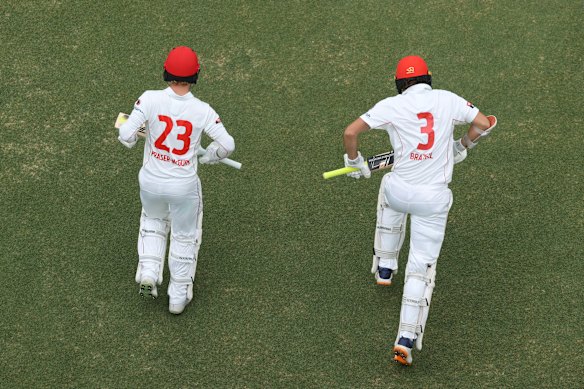 Jake Fraser-McGurk and Kyle Brazell of the Redbacks walk out to bat during the Sheffield Shield match between New South Wales Blues and South Australia Redbacks at Cricket Central in Sydney