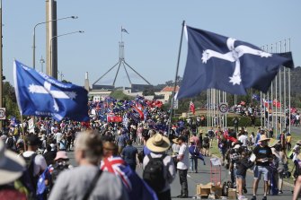 Convoy to Canberra protesters march towards the parliamentary triangle in Canberra.