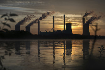 The coal-fired Plant Scherer, one of the top carbon dioxide emitters in the US, stands in the distance in Juliette, Georgia.