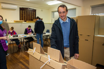 Dave Sharma casts his vote at a poll booth in Paddington Public School.