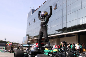 Lewis Hamilton celebrates victory in Sao Paulo.