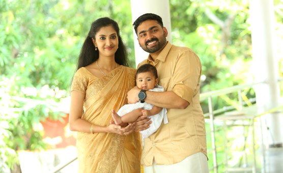 Roby Varghese and wife Juna Devasia and baby Tessa.