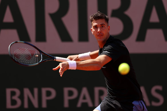 Thanasi Kokkinakis en route to a straight-sets win over Dan Evans during round one of the French Open on Sunday.